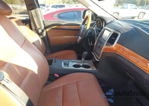 2013 Jeep Grand Cherokee Overland z USA, uszkodzony, nr VIN 1C4RJFCTXDC655834